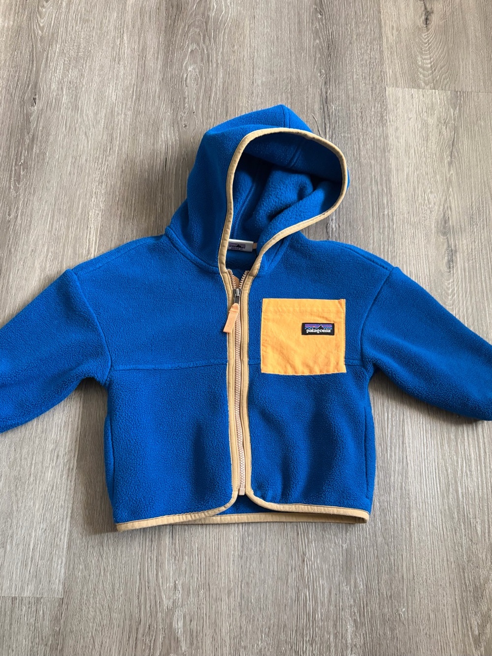 Patagonia Kids Royal Blue Fleece Hoodie with Yellow Chest Pocket